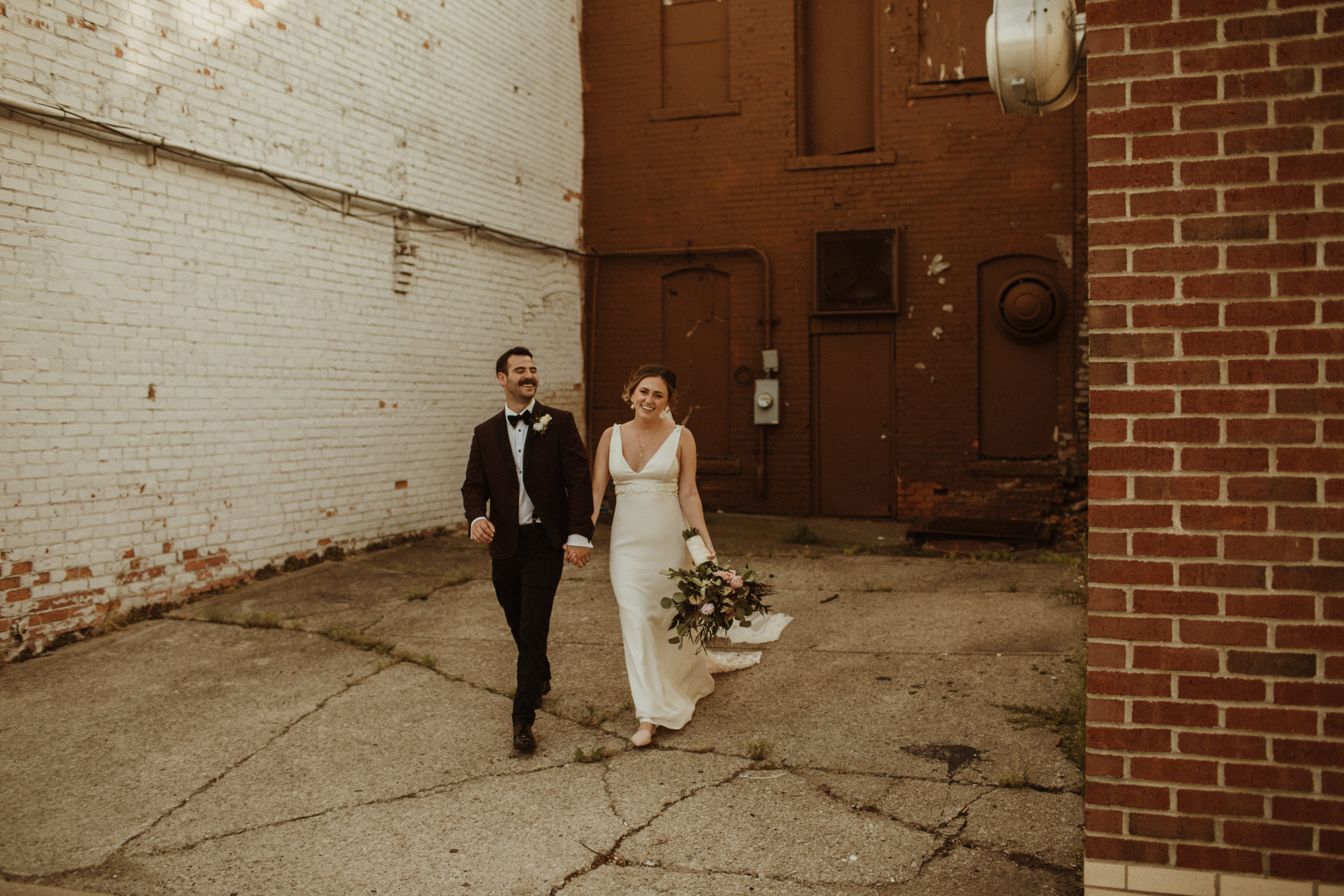 downtown mt clemens orange wall bride and groom wedding photos