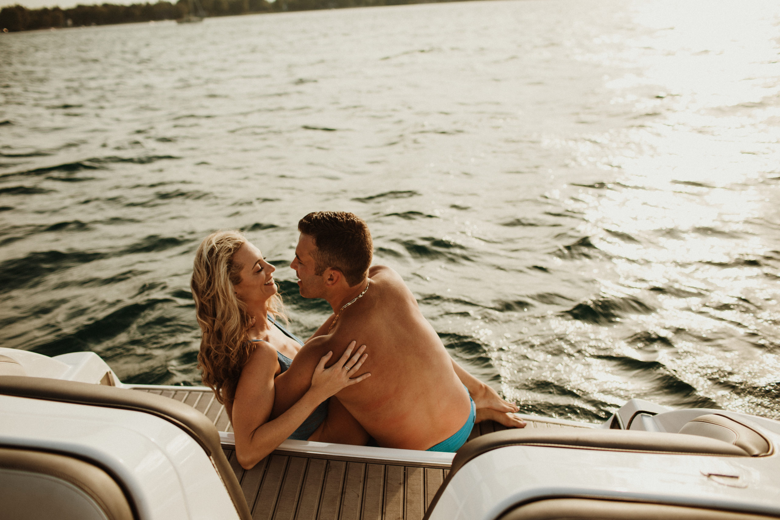 Lake Huron couples photoshoot on a boat
